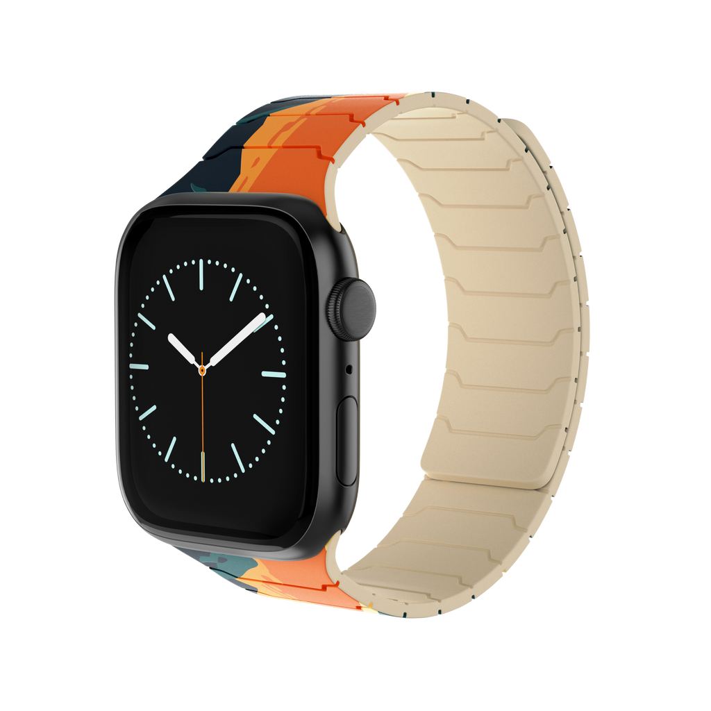 Magnetic Apple Watch with the Tropic Dusk silicone band featuring a colorful sunset landscape design.