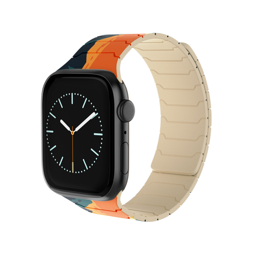 Magnetic Apple Watch with the Tropic Dusk silicone band featuring a colorful sunset landscape design.