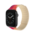 Magnetic Apple Watch with the Pink Horizon silicone band featuring a vibrant mountain sunset landscape design.